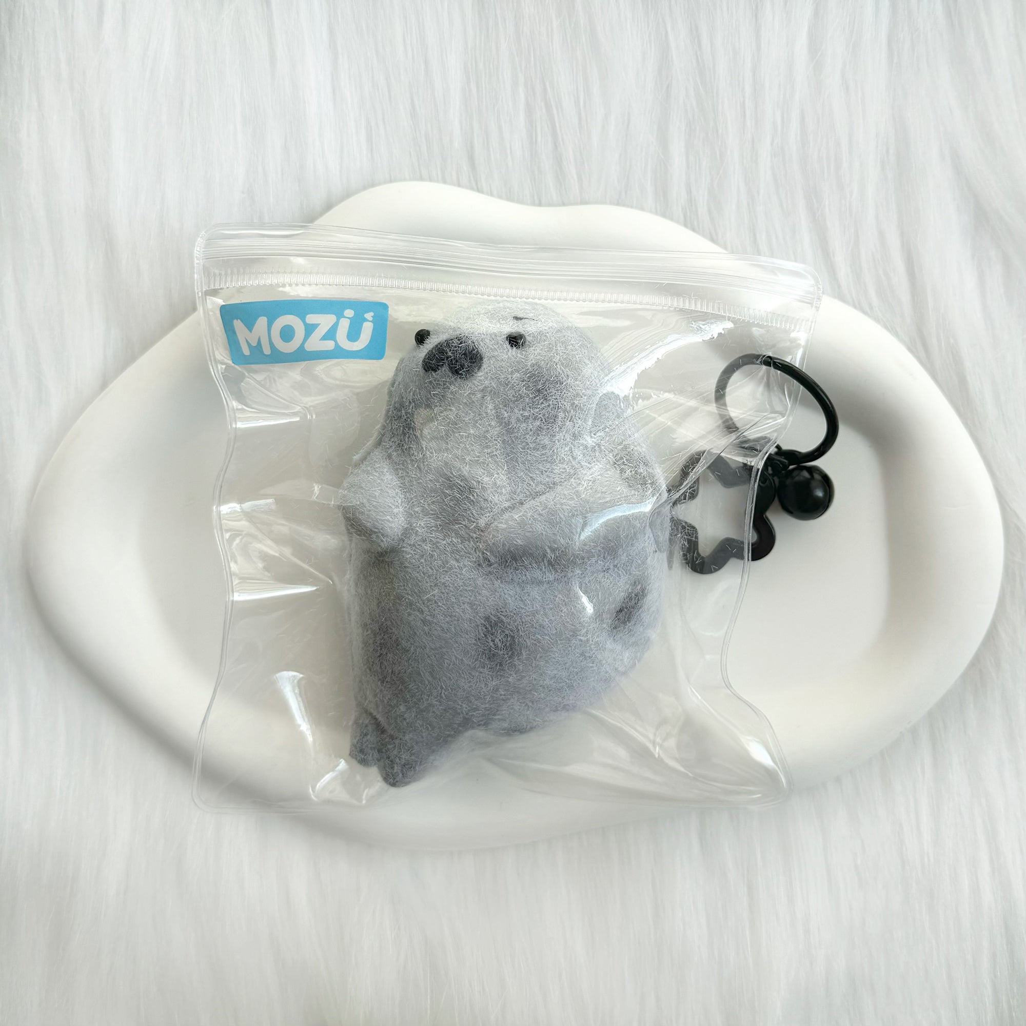MOZÜ
