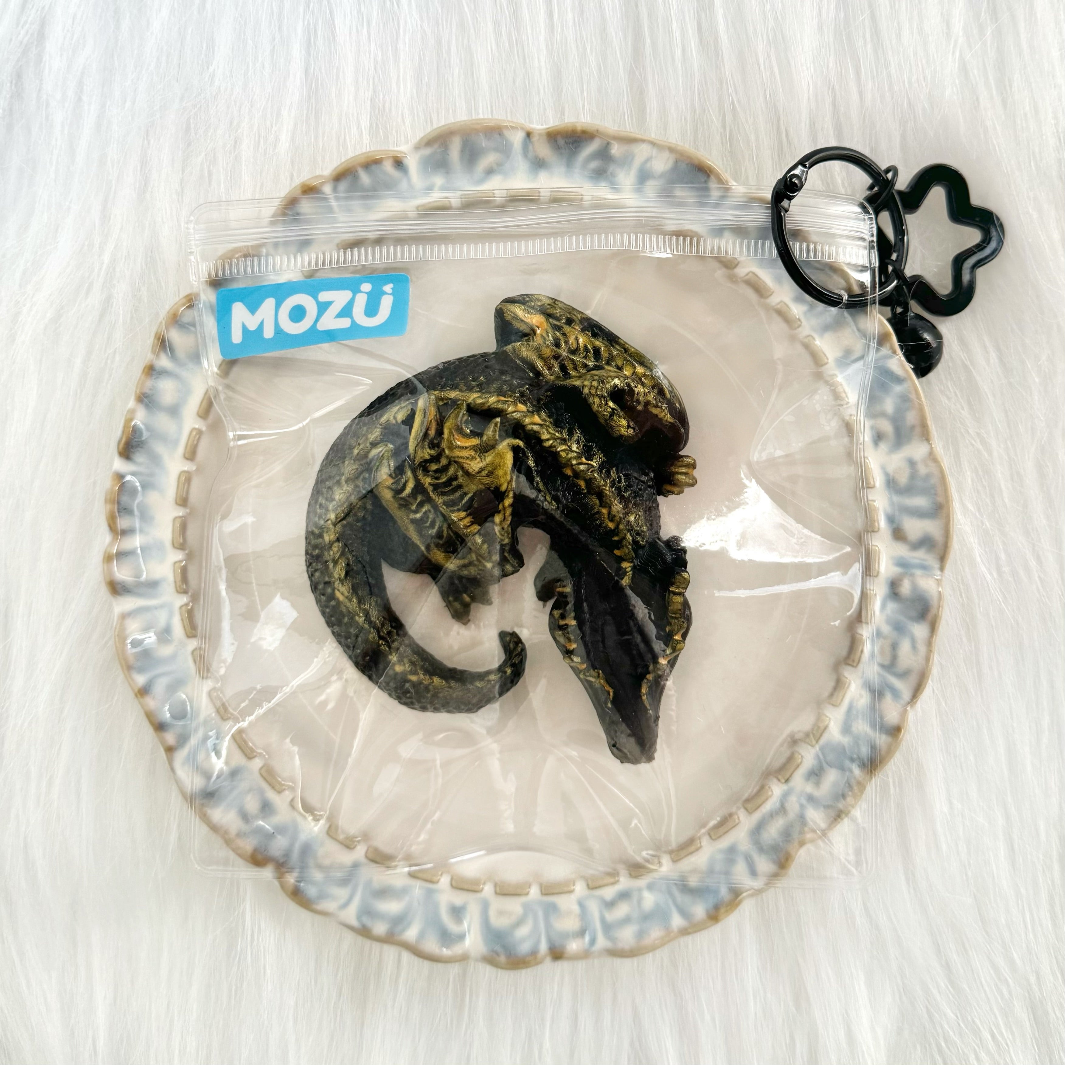MOZÜ